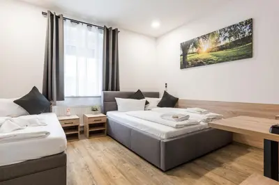 Ein Bett oder Betten in einem Zimmer der Unterkunft Hotel Montenegro