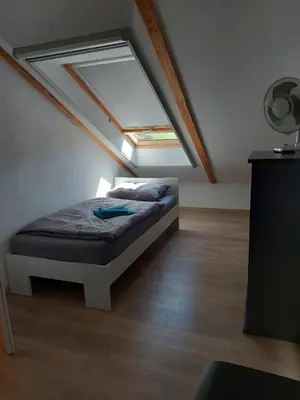 Ein Bett oder Betten in einem Zimmer der Unterkunft Prinz