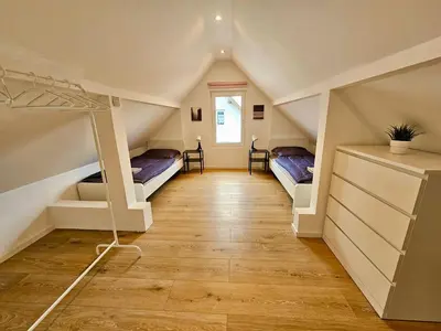 Ein Bett oder Betten in einem Zimmer der Unterkunft Work & Stay House in Biebelnheim