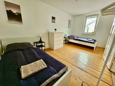 Ein Bett oder Betten in einem Zimmer der Unterkunft Work & Stay House in Biebelnheim
