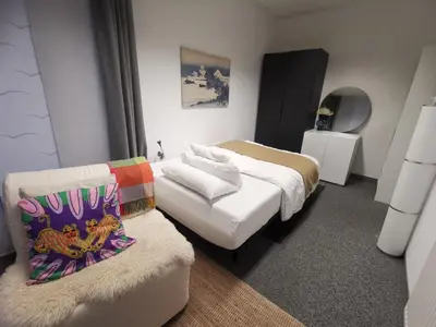 Ein Bett oder Betten in einem Zimmer der Unterkunft Stadtwohnung Miltenberg Perle am Main
