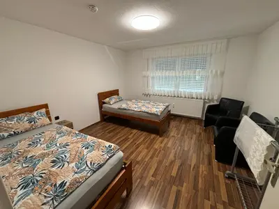 Ein Bett oder Betten in einem Zimmer der Unterkunft Ferienwohnung Grimm 3