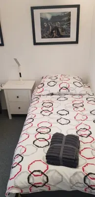 Ein Bett oder Betten in einem Zimmer der Unterkunft Hotel Adriana