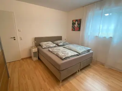 Ein Bett oder Betten in einem Zimmer der Unterkunft Ferienwohnung an den Weinbergen