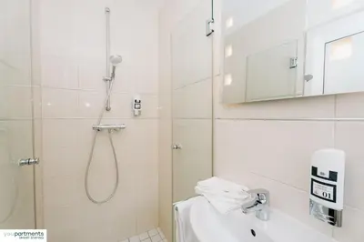 Ein Badezimmer in der Unterkunft YOUPARTMENTS - zentrale Micro Apartments