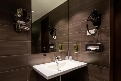 Ein Badezimmer in der Unterkunft Tobbaccon Hotel