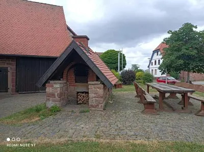 Ein Garten an der Unterkunft Gemütliches Häuschen