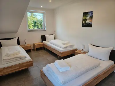 Ein Bett oder Betten in einem Zimmer der Unterkunft Stebbacher Ferienwohnung