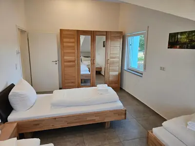 Ein Bett oder Betten in einem Zimmer der Unterkunft Stebbacher Ferienwohnung