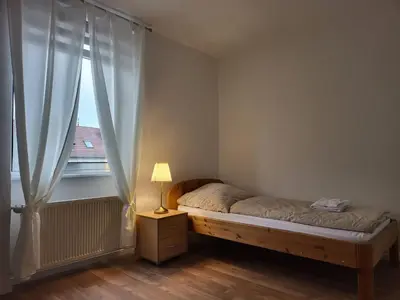 Ein Bett oder Betten in einem Zimmer der Unterkunft Privates Einzelzimmer direkt an der Uniklinik Mainz