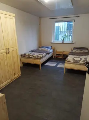 Ein Bett oder Betten in einem Zimmer der Unterkunft Das Tor zum Odenwald