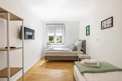 Ein Bett oder Betten in einem Zimmer der Unterkunft Ferienwohnung Neckarblick Heilbronn
