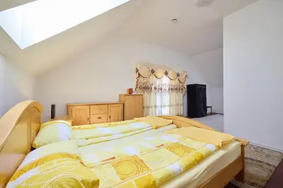 Ein Bett oder Betten in einem Zimmer der Unterkunft Ferienhaus SWD