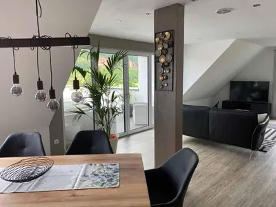 Ein Sitzbereich in der Unterkunft Ferienwohnung Weingut Sturm
