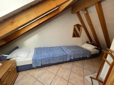 Ein Bett oder Betten in einem Zimmer der Unterkunft Glattbacher Hof Ferienwohnung 9