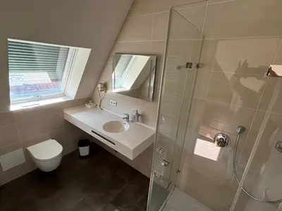 Ein Badezimmer in der Unterkunft Hotel Ortel GmbH