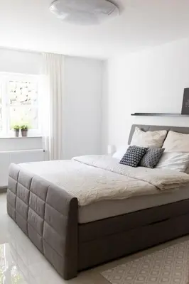 Ein Bett oder Betten in einem Zimmer der Unterkunft Ferienwohnung Steuerwald