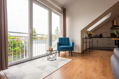 Ein Sitzbereich in der Unterkunft SCHLOSSBERG RESIDENCES - Design City-Apartment Nähe SAP und Hockenheimring