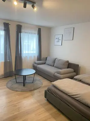 Ein Sitzbereich in der Unterkunft Ferienwohnung S19 - City-Apartment 33