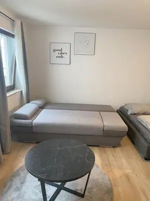 Ein Sitzbereich in der Unterkunft Ferienwohnung S19 - City-Apartment 33
