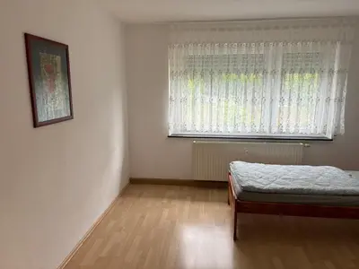 Ein Bett oder Betten in einem Zimmer der Unterkunft Ferienwohnung Grimm 2