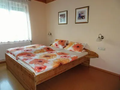 Ein Bett oder Betten in einem Zimmer der Unterkunft Ferienwohnung Sartorius