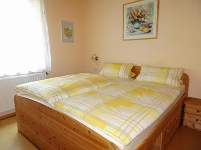 Ein Bett oder Betten in einem Zimmer der Unterkunft Ferienwohnung Sartorius