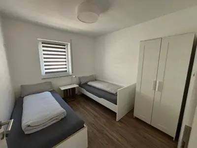 Ein Bett oder Betten in einem Zimmer der Unterkunft Ferienwohnung Gergert Nr 5