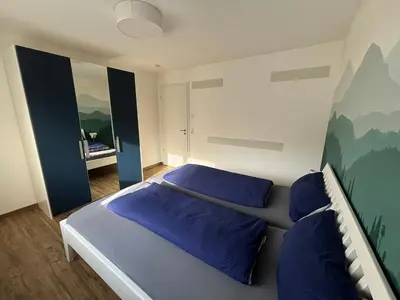 Ein Bett oder Betten in einem Zimmer der Unterkunft Ferienwohnung Gergert Nr 5