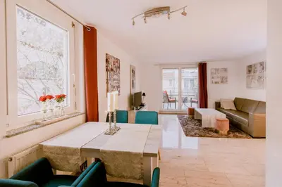 Ein Sitzbereich in der Unterkunft Stylishes Apartement Poststraße 36