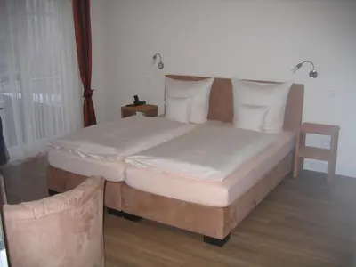 Ein Bett oder Betten in einem Zimmer der Unterkunft Gästehaus Oswald