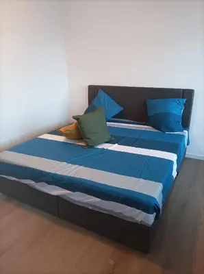 Ein Bett oder Betten in einem Zimmer der Unterkunft RK living room