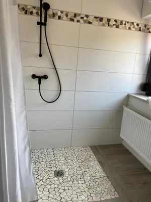Ein Badezimmer in der Unterkunft Kleine, aber feine Unterkunft mit direktem Waldzugang