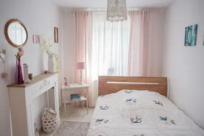 Ein Bett oder Betten in einem Zimmer der Unterkunft Romantische Ferienwohnung