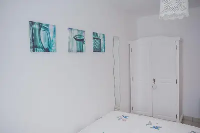 Ein Bett oder Betten in einem Zimmer der Unterkunft Romantische Ferienwohnung