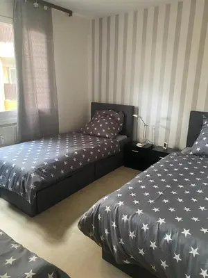 Ein Bett oder Betten in einem Zimmer der Unterkunft Top möblierte Unterkunft in Langen