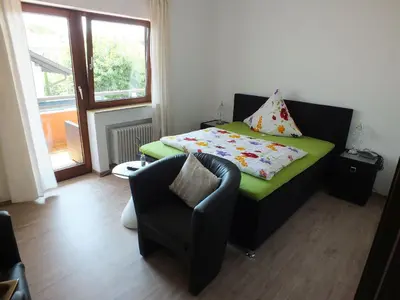 Ein Bett oder Betten in einem Zimmer der Unterkunft Gästehaus Müller