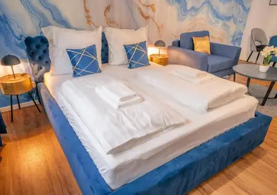 Ein Bett oder Betten in einem Zimmer der Unterkunft Noble Studio - 1 Min to HBF