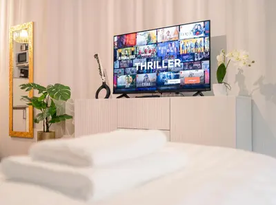 Ein Bett oder Betten in einem Zimmer der Unterkunft Noble Studio - 1 Min to HBF