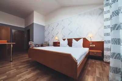 Ein Bett oder Betten in einem Zimmer der Unterkunft Weingut Zimmermann
