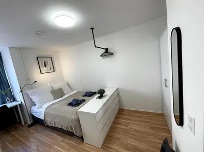 Ein Bett oder Betten in einem Zimmer der Unterkunft Zentrales City-Studio in Mannheimer Innenstadt