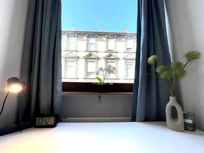 Ein Bett oder Betten in einem Zimmer der Unterkunft Zentrales City-Studio in Mannheimer Innenstadt