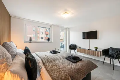 TV/Unterhaltungsangebot in der Unterkunft LIVINGLike-Apartment - Central & Spacious with Balkony & Garage, Coffee - 103m2