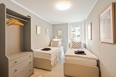 Ein Bett oder Betten in einem Zimmer der Unterkunft LIVINGLike-Apartment - Central & Spacious with Balkony & Garage, Coffee - 103m2