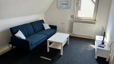 Ein Sitzbereich in der Unterkunft Teos Appartments LU