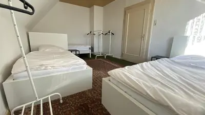 Ein Bett oder Betten in einem Zimmer der Unterkunft Teos Appartments LU