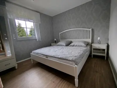 Ein Bett oder Betten in einem Zimmer der Unterkunft Ferienwohnung LandZeit 1