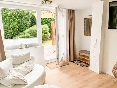 Ein Sitzbereich in der Unterkunft Ferienwohnung Fröhlich