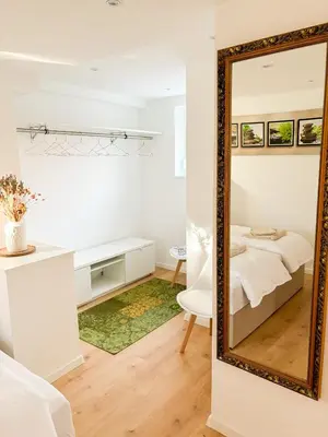 Ein Bett oder Betten in einem Zimmer der Unterkunft Ferienwohnung Fröhlich