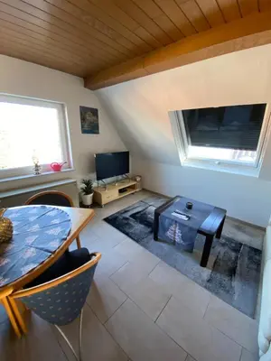 Ein Sitzbereich in der Unterkunft Ferienwohnung Altrip